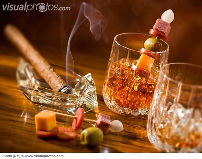 whiskey_on_the_rocks_with_savoury_skewer_burning_cigar_680099.jpg